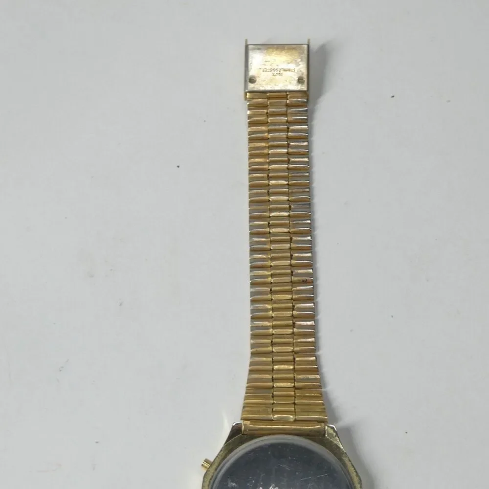 Dynamic LCD Quartz Watch Vintage Goldtone Black Hong Kong Wristwatch